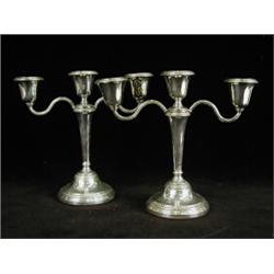 A pair of silver twin-branch candelabra, Birmingham 1967, 21cm high Est. 200/300...