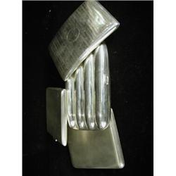 A gentlemans silver and gilt cigar case, Birmingham 1900, and three silver cigarette cases Est. 1...
