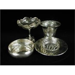 A silver sweetmeet dish, Birmingham 1912, a pierced silver holder, a sterling silver wine taster...