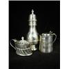 Image 1 : An Edwardian silver caster, London 1906, 18.5cm high, a half fluted mustard pot, Sheffield 1928,...