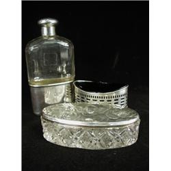 A George V silver and glass hip flask, London 1929, an Edwardian oval silver and cut glass pin bo...