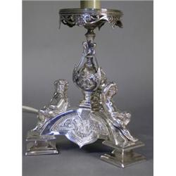 A 19th century silver plated centrepiece (converted to a table lamp), struck G.S., the cherubs wi...