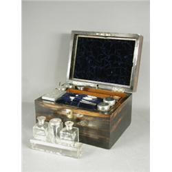A Victorian coromandel toilet box, with silver topped matching bottles, various dates, with lift...