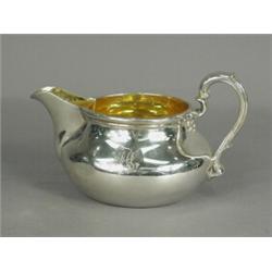 A Victorian silver jug, initialled both sides and dated Feb 7th 1861, makers mark for R. Garrard,...
