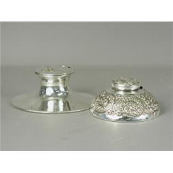 A silver capstan inkwell 1905, 14cm diameter, and a sterling silver inkwell with cast decoration,...