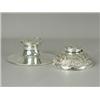 Image 1 : A silver capstan inkwell 1905, 14cm diameter, and a sterling silver inkwell with cast decoration,...