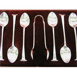 A set of six silver Onslow pattern teaspoons and a pair of sugar tongs in a fitted case, makers m...