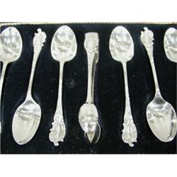 A set of six silver teaspoons and a pair of tongs, in a fitted case, makers mark for Walker and H...