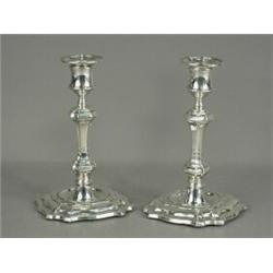 A pair of George III style silver candlesticks Est. 180/250...