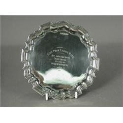A late George V Walker & Hall silver card tray on three scroll feet, engraved 'High Peak Ladies R...