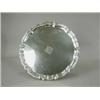 Image 1 : A late George V silver salver supported upon three feet, hallmarked Sheffield 1934, 31cm diameter...