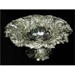 A Victorian silver fruit dish, embossed and chased with Bacchanalian masks and scrolling vines, w...