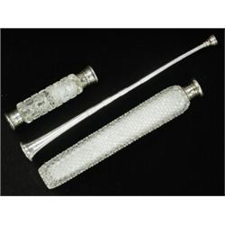 A silver horn candle extinguisher, 30cm long, a hobnail cut flask and a Victorian cut glass and s...