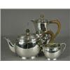 Image 1 : A George VI silver three piece tea set, hallmarked Sheffield 1944, 38ozs (monogrammed) Est. 200/3...
