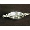 Image 1 : A silver wine taster by R. E. Stone, with cast handles and a hammered finish, London 1946, 9cm di...