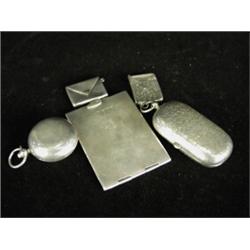 Five silver items: Two stamp cases Two sovereign cases and An aide memoire, all hallmarked Est. 1...