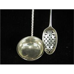 A Victorian brandy ladle by George Angel (?) 1858, and an 18th century silver mote spoon, marks i...