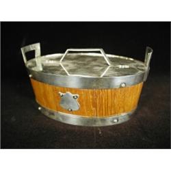 An oak cased and plated butterdish, of oval form, 16cm Est. 80/120...
