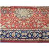 Image 1 : A modern red ground handmade woollen Persian Isphahan carpet, 3.41 x 2.45m Est. 350/400...