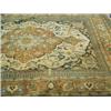 Image 1 : A large Persian rug with a central foliate medallion, 200 x 290cm Est. 100/200...