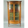 Image 1 : An Edwardian walnut display cabinet, with carved decoration, and leaded glass doors, 180 x 100...
