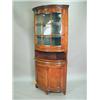 Image 1 : A 19th century mahogany bow fronted free standing corner cupboard, with dentil moulding above...