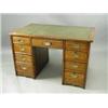 Image 1 : A late Victorian oak twin pedestal desk with recessed brass handles, 1.22m long Est. 400/500...