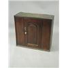 Image 1 : An oak cupboard with a single panelled door, basically 17th century, 64cm high Est. 200/300...