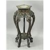 Image 1 : A 19th century Chinese carved hardwood jardiniFre stand, with an inset marble top on five legs...