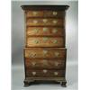 Image 1 : A George III mahogany chest on chest, the cornice with carved mouldings above two short and th...