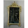 Image 1 : A 20th century carved giltwood wall mirror, (with repairs), 114cm high Est. 400/500...