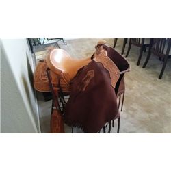 CUSTOM SADDLE AND CHAPS By Granite Station Saddlery