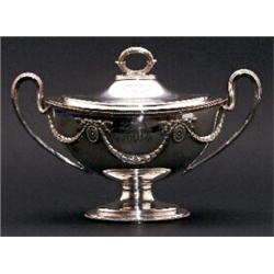 An Edwardian Neo-Classical style silver plated twin handled oval tureen and cover, cast with ribb