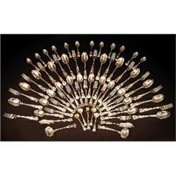A Victorian Kings pattern loose canteen of cutlery, engraved monogram, comprising two sauce ladle