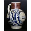 Image 1 : A German saltglazed stoneware bulbous jug, circa 1800, with incised ornament depicting George III