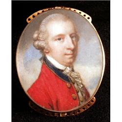 A shoulder length oval portrait miniature of a gentleman, circa 1790, in red frock jacket, on ivo