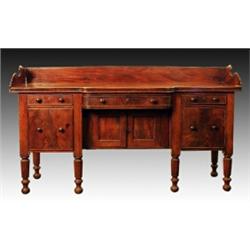 A George IV mahogany sideboard, circa 1825, probably Irish the panelled back and rectangular brea