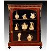 Image 1 : A late Victorian burr walnut, maple and ebonised, ormolu mounted china cabinet, circa 1890, the s
