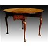 Image 1 : A George II mahogany oval drop leaf table, fitted with a single end drawer, on cabriole legs with