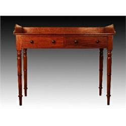 A William IV Irish mahogany table, stamped William & Gibton, the panelled gallery back and rectan