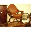 Image 1 : Late Victorian mahogany open armed saddle chair with leather upholstery on turned H stretcher…