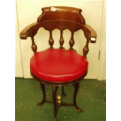 George V stamped mahogany music chair on turned and shaped columns on metal base…