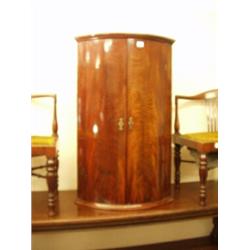Georgian mahogany bow fronted corner cupboard with shaped oak shelves, 36" high…