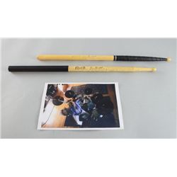 Two drumsticks both used and signed by Mick Fleetwood