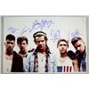 Image 1 : One Direction, English-Irish pop boy band, a large