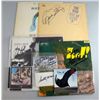 Image 1 : A collection of signed items including LP sleeves /
