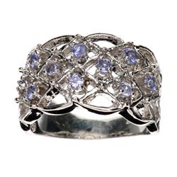 APP: 1.2k 0.28CT Round Cut Tanzanite and Platinum Over Sterling Silver Ring