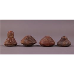 Four Pre-Columbian Husos (textile spindle wheels) from