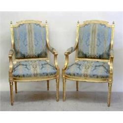 PAIR OF CHARLES X STYLE CARVED AND GILTWOOD ARM CHAIRS...