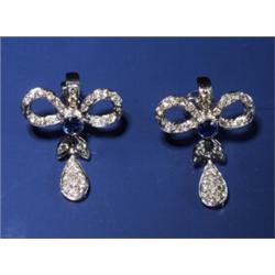 DIAMOND SAPPHIRES 18K BOW EARRINGS...